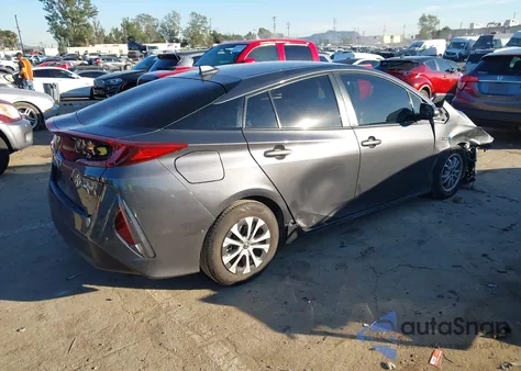 2021 Toyota Prius Prime Limited from USA, damaged, VIN JTDKAMFP2M3190485